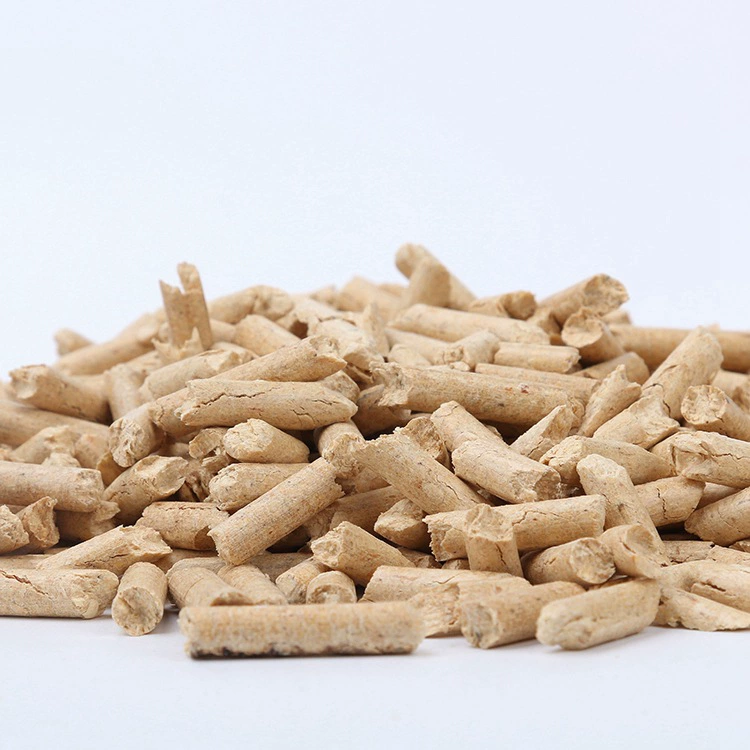 Unbranded wood fuel pellets on a plain background